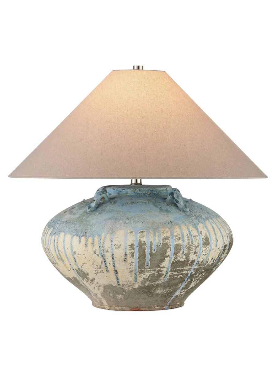 Handcrafted terracotta table lamp with pale ivory finish and antique blue drip glaze, featuring a large jar-shaped base and empire shade.