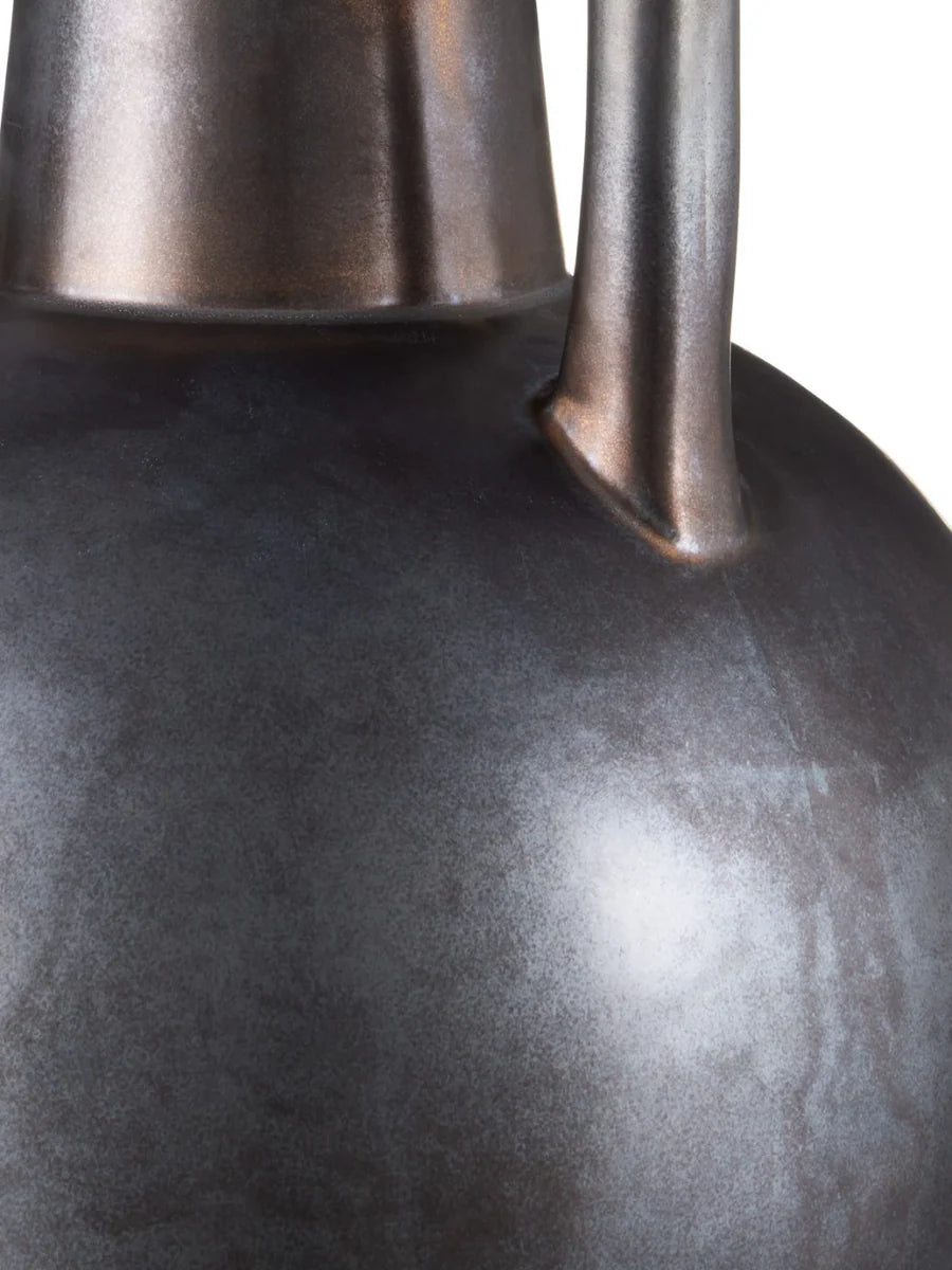 Jug-shaped gray ceramic table lamp with reactive glaze finish, bronze accents, and a classic empire shade.