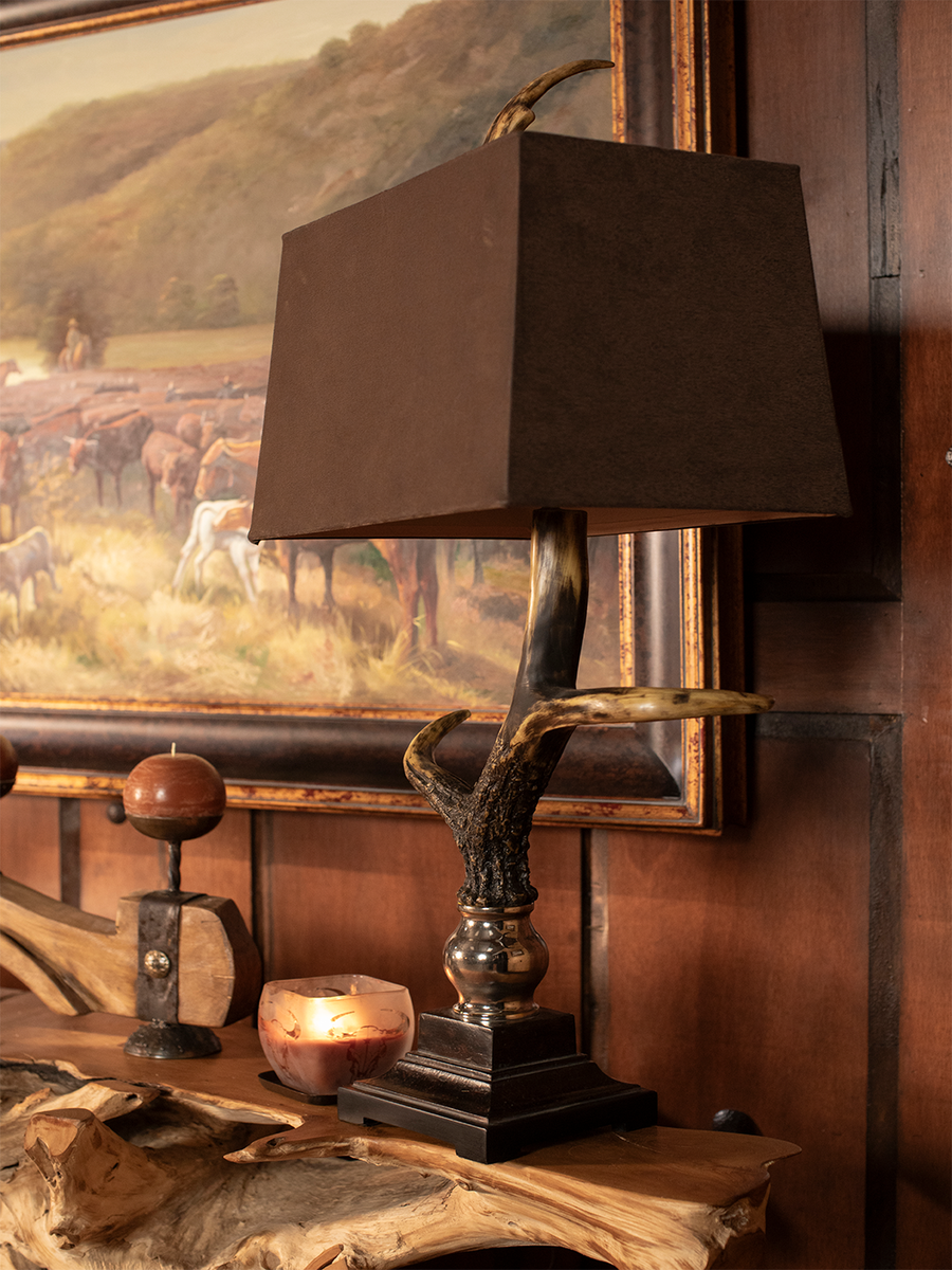 Stag Horn Table Lamp with bone ivory antler-style base, chocolate suede rectangular shade, and rustic wood-tone details.